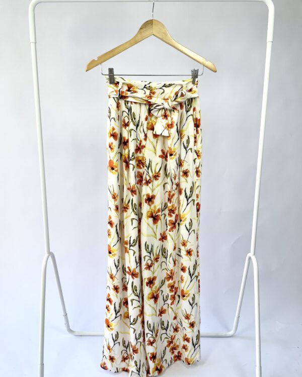 Calça branca com flores LITTLE MOON - P VENDIDO SISTEMA OTO